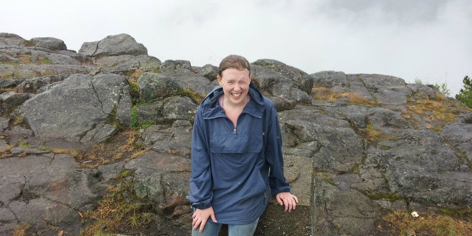 I'm on top of a mountain even though the rain is tryin' to get me down